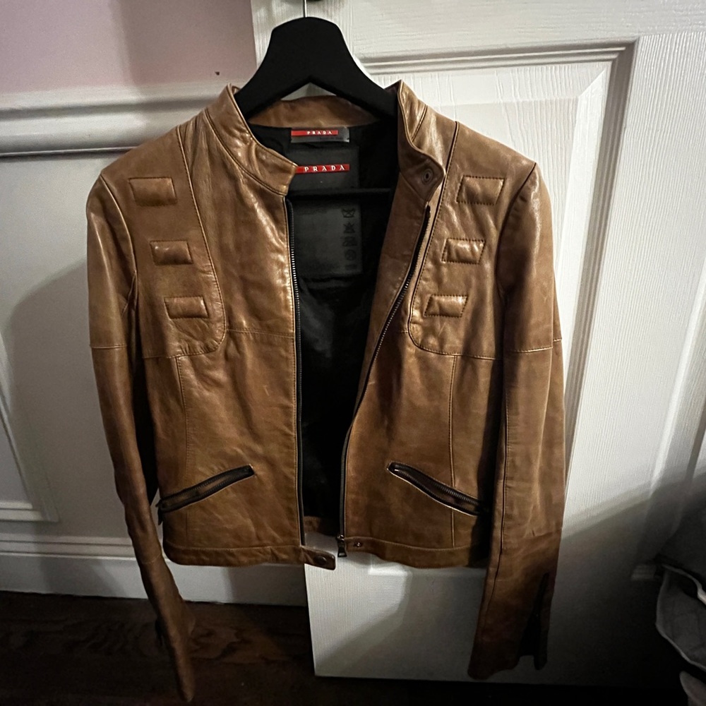 Prada saddle brown genuine leather coat.Almost brand new wore once. Was to small